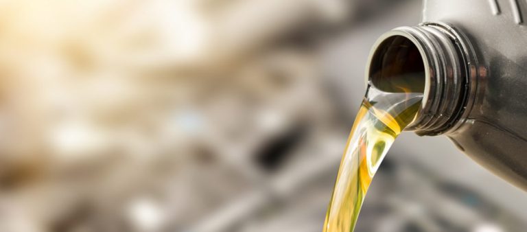 Pouring,Oil,To,Car,Engine.,Fresh,Oil,Poured,During,An