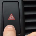 Pressing,Car,Hazard,Emergency,Lights,Button,Close,Up