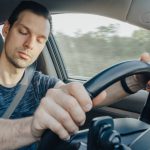 Fatigue,Of,Sleeping,Driver,Driving,At,Speed,While,Holding,Wheel