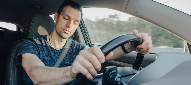Fatigue,Of,Sleeping,Driver,Driving,At,Speed,While,Holding,Wheel