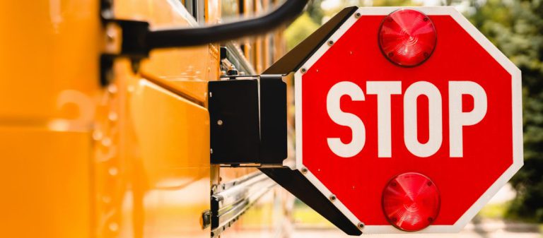 Close,Up,Yellow,School,Bus.,Stop,Sign.,Be,Careful,,Schoolchildren
