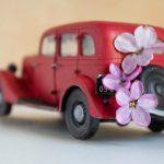 Miniature,Toy,Red,Retro,Car,On,A,White,Background.,Red
