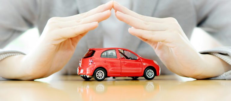 Businesswoman,Hands,And,Car,As,Protection,Of,Car,Concept