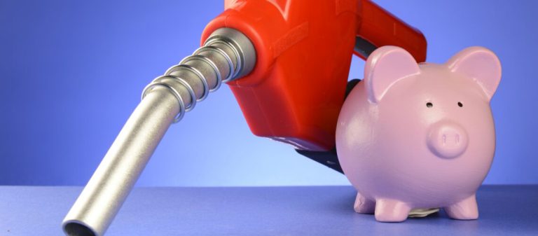 A,Concept,Of,Saving,Money,At,The,Gas,Pumps,Using