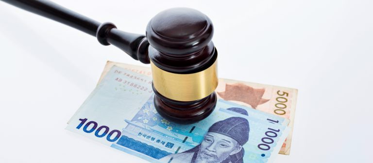 Law,Gavel,On,South,Korea,Money,Against,White,Background.