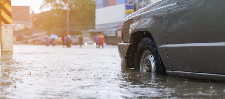 Flood,Water,-,People,Walking,In,The,Rain,On,Flooded